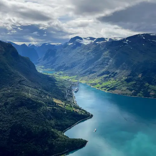 Iona cruise ship moored in Olden, Norway from above